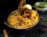 A picture of step 11 of Kolkata Special Mutton Dum Biryani.
