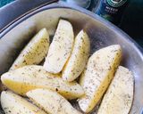 A picture of step 3 of Mixed-herb Potato Wedges.