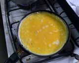 Foto del paso 4 de la receta: Chistorra con huevo, cebolla caramelizada y papas fritas