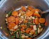 A picture of step 4 of Sweet and Sour Carrots and 3 beans.