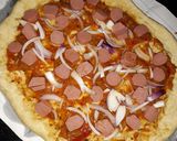 A picture of step 3 of Sausage pizza.