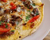 Foto del paso 9 de la receta: Tortilla abierta de rovellons, emmental y tomate