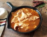 A picture of step 9 of Poricha Appalam Vatha Kuzhambu | Tamarind Curry with Fried Papadam.