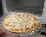 A picture of step 7 of Margareta pizza.