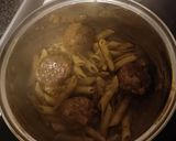A picture of step 7 of Turkey Thai curry meatballs with pasta.