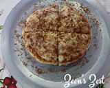 A picture of step 5 of Za'atar loaded Cheese Pizza.