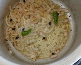 A picture of step 2 of Weat and moong dal dalia.