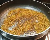 A picture of step 2 of Green chilli pickle.