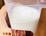 A picture of step 2 of Dal Masoor cooked with milk.