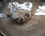A picture of step 1 of Red rice laddoo / kaikuththal arisi urundai.