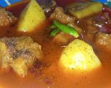 A picture of step 11 of Beef Aloo Gosht.