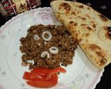A picture of step 18 of Barb' q dhuwan qeema.