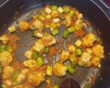 Foto del paso 3 de la receta: Arroz con bacalao ajos tiernos y coliflor