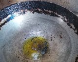 A picture of step 2 of Sorshe Ilish.