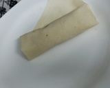 A picture of step 2 of Macroni springrolls or box patties.