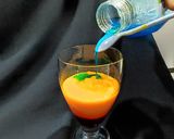 A picture of step 2 of Devil's Knight Layered Mocktail.