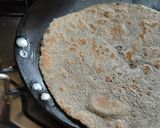 A picture of step 4 of Bajra Bhakri with seasome seeds.