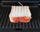 A picture of step 4 of Tomato and Cheese Grilled Sandwich.