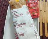 A picture of step 6 of Wheat cheese veggie wrap.