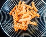 A picture of step 3 of Crispy Edible Diyas filled with Pasta Chat.