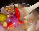 A picture of step 6 of Foul Medames, Like Molasses.