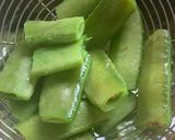 A picture of step 2 of Aloo-Sem/potato-butter bean Pickle.