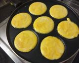 A picture of step 5 of Mango Pancakes with Almonds and Caremal Sauce.