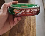 A picture of step 1 of Microwave Sardines in Tomato Sauce.