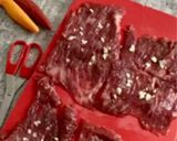 A picture of step 1 of Stuffed Horse Braciole Cooked in Tomato Sauce.
