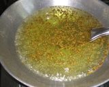 A picture of step 1 of Jeera Rice.