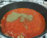 Foto del paso 3 de la receta: Pechuga empanizada bañada en salsa de tomate