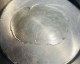 A picture of step 1 of Cheesy Cauliflower Rice.