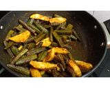 A picture of step 2 of Dry bhindi aloo sabzi without onion and ginger garlic.