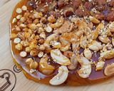A picture of step 10 of Mixed nuts chikki pizza (chizza).