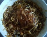 A picture of step 10 of Japanese poach smoke haddock in katsu curry past and teriyaki sauce gekkeikan dry sake fine egg noodles.
