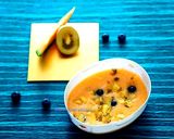 A picture of step 2 of Muskmelon soup topped with green tea cake croutons.