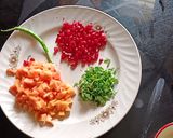 A picture of step 1 of Papaya Anar Raita.