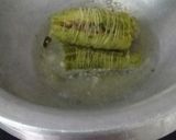 A picture of step 5 of Bharva karele.
