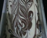 A picture of step 8 of Tahini Chocolate Cake with Coconut Chocolate Mousse frosting.