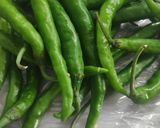 A picture of step 1 of Mustard Green Chillies 🤩.