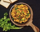 A picture of step 8 of Bread Upma.
