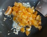 A picture of step 1 of Orange halwa/unek recipe.