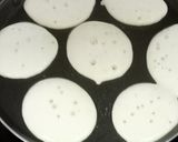 A picture of step 2 of Nolen Gurer Chitai Dudh Pithe.