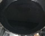 A picture of step 2 of Dahi baingan.