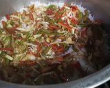 A picture of step 9 of Singaporean rice.