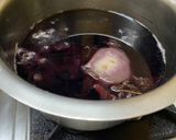A picture of step 4 of Butterfly Peaflower Poached Pears.