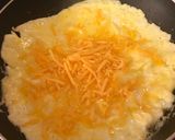 A picture of step 4 of Happy Face omurice.