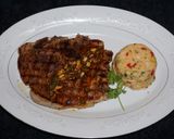 A picture of step 4 of Grilled Pork Chops with Pine Nut Chimichurri and White Bean Timbale.