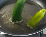 Une image de l'étape 5 de Poivrons Farcis accompagnés de boulgour et sauce tomate.