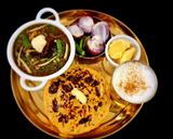 A picture of step 4 of Sarson ka Saag and makki ki Roti.